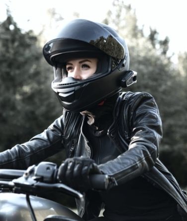 woman sitting on motorcycle
